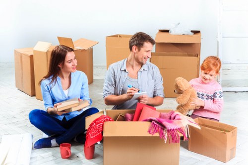 Moving house planning in Barnes with boxes and checklist