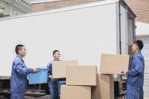 Removal team preparing items for transport under service terms