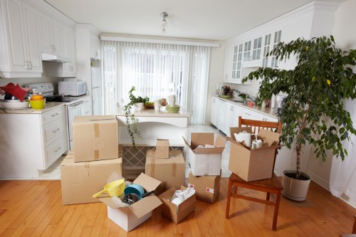 Removal crew unloading belongings at a Barnes property