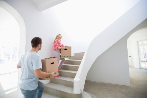 Furniture and boxes being loaded for transport in Barnes