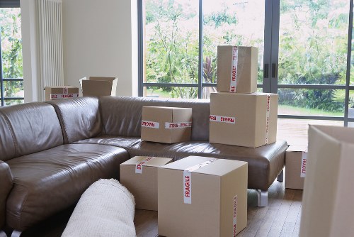 Charity donation boxes and reusable furniture prepared for collection